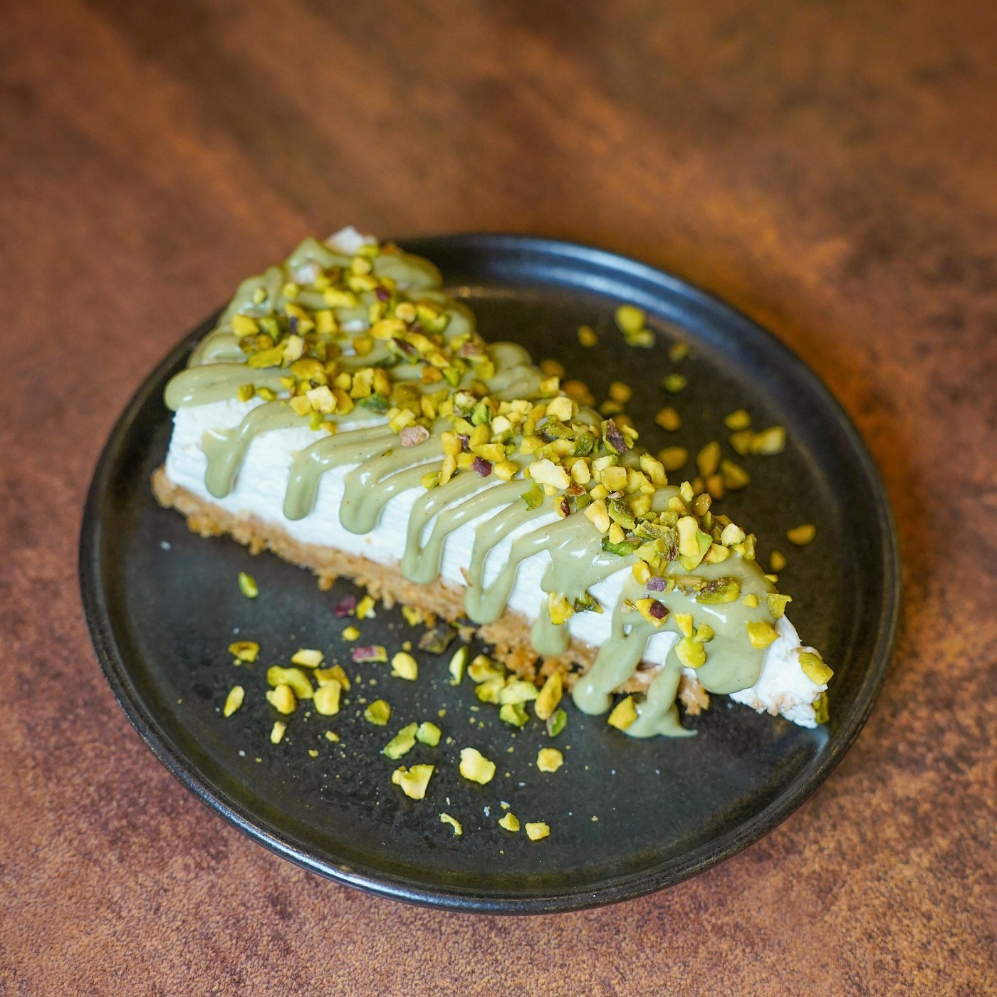 Cheesecake artesanal servida en Artéteca, restaurante italiano en Barcelona